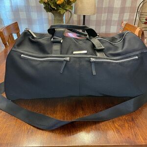 Versace Parfums black duffle bag